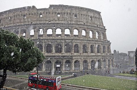 Snow falls in Rome for the first time in 26 YEARS