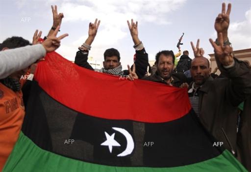 http://www.freedomsphoenix.com/Uploads/Graphics/023-0301130715-Libyan-Rebels-Fight-Off-Qaddafi.jpg