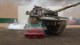 Poppy Harlow crushes car with tank!